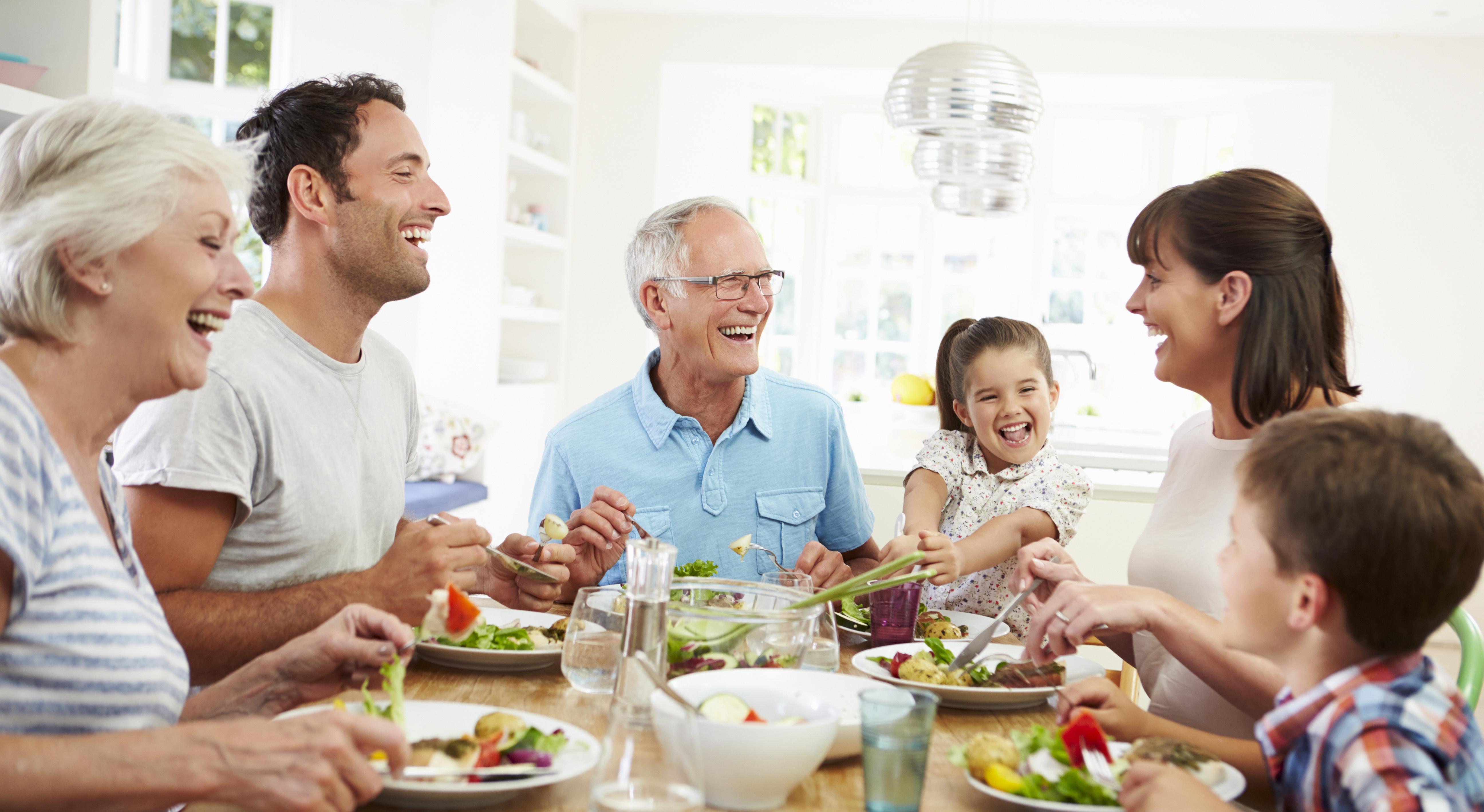 family sitting around a dinner table